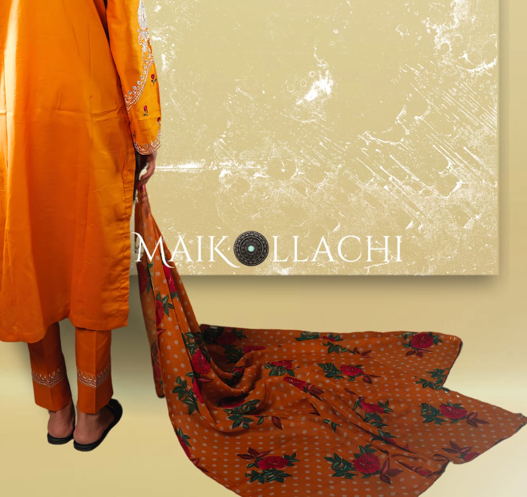 Celebrate in Style with Mai Kollachi's Vibrant Orange Embroidered Ensemble