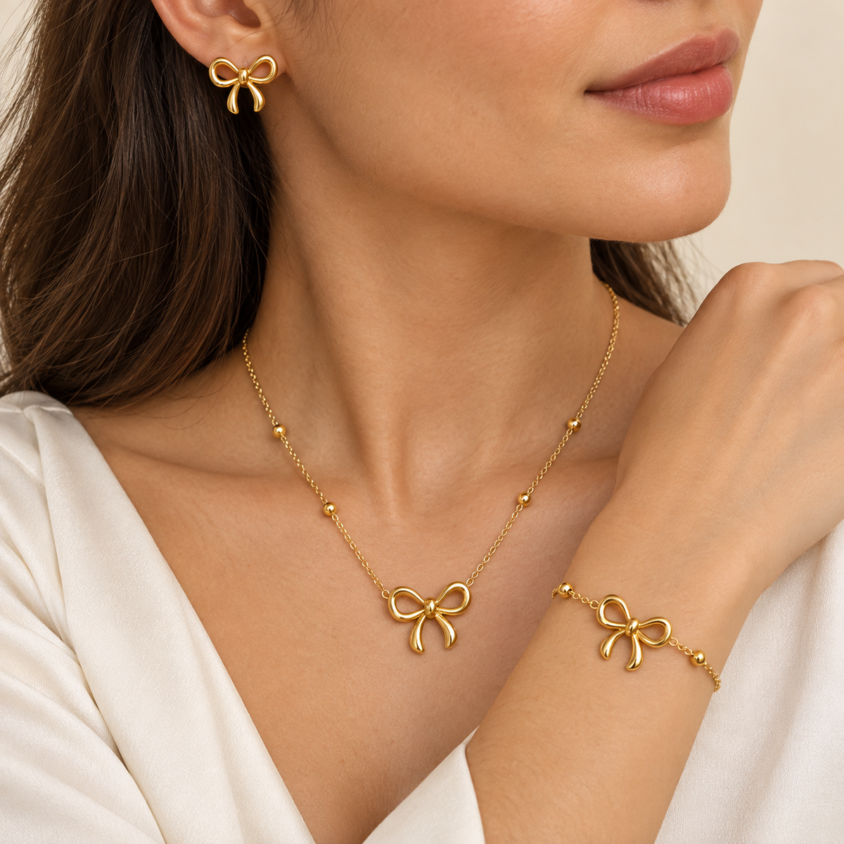 Golden Bow stainless steel jewellery set with necklace bracelet and earrings