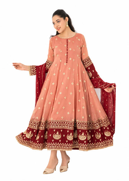 Coral pink embroidered Anarkali 3 piece Pakistani suit with red and gold border by Mai Kollachi