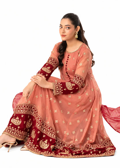 Coral pink embroidered Anarkali 3 piece Pakistani suit with red and gold border by Mai Kollachi